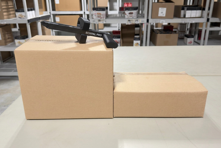 A right-sized box cut down to fit next to an oversized stock box