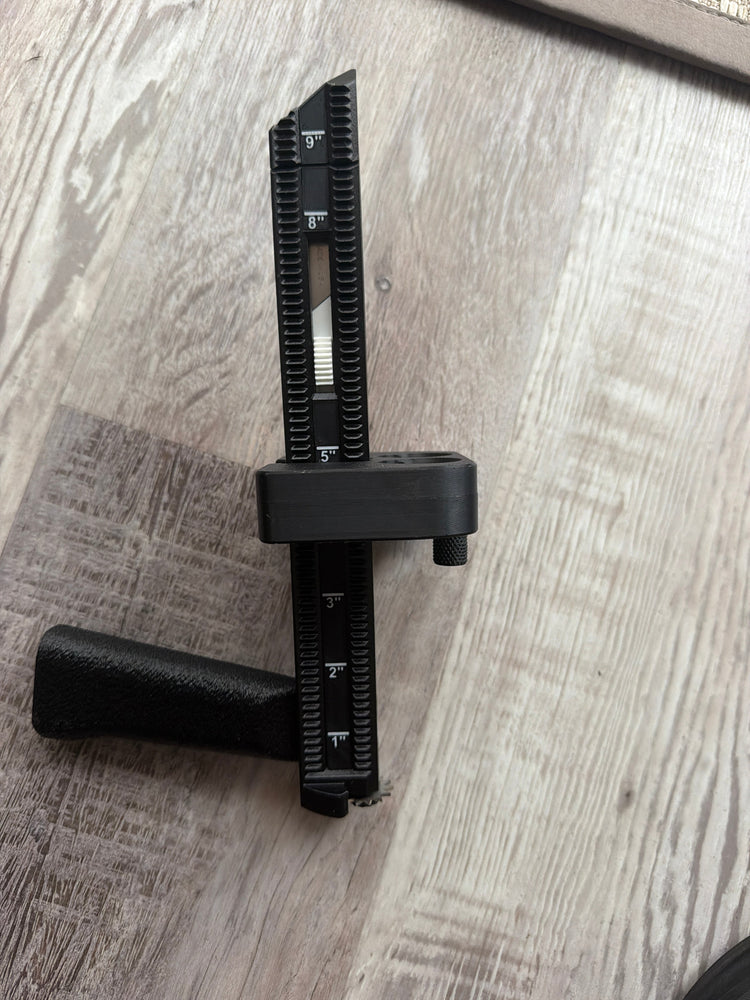 Close-up of the BoxPal Pro 2.0 depth guide marked 1 to 9 inches