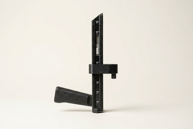 Side view of BoxPal Pro 2.0 standing upright, with the positioner set near 5 inches